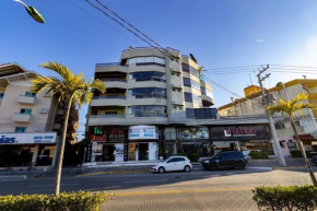 132 - Localizado na Avenida Principal de Bombas - Apto com 02 dormitórios